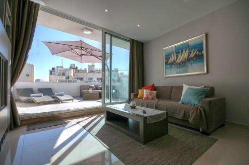 พื้นที่นั่งเล่นของ Penthouse Deluxe