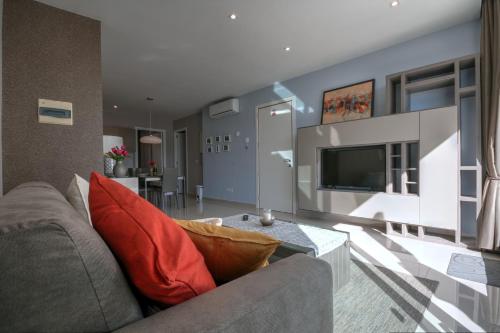 TV in/ali zabaviščno središče v nastanitvi Penthouse Deluxe