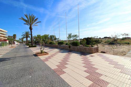 Φωτογραφία από το άλμπουμ του Global Properties, Practico apartamento con piscina en la playa de Canet σε Canet d'en Berenguer