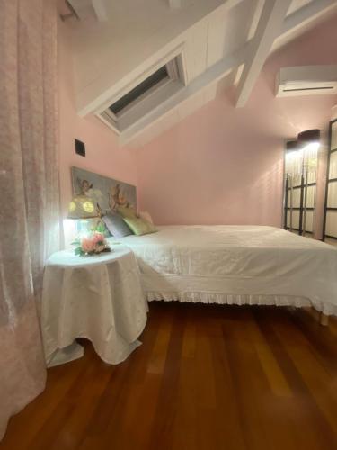 Postel nebo postele na pokoji v ubytování Villa Elianna in una oasi marina
