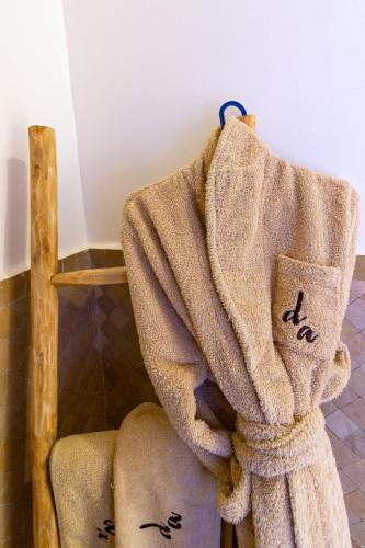 a towel hanging on a rack in a bathroom at Dakhla Attitude in Dakhla