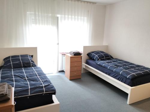 Katil atau katil-katil dalam bilik di 123-Zimmerverleih Mosbach