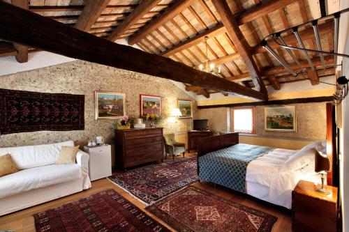 Postel nebo postele na pokoji v ubytování Resort Villa Manin