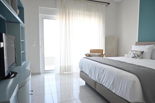 Ένα ή περισσότερα κρεβάτια σε δωμάτιο στο GianAngelo Holiday Villa