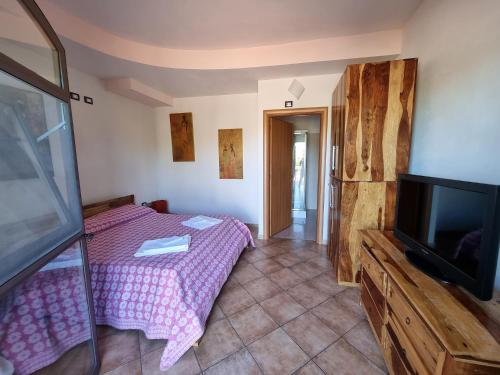 Μια τηλεόραση ή/και κέντρο ψυχαγωγίας στο Agriturismo Le Rondini Di San Bartolo