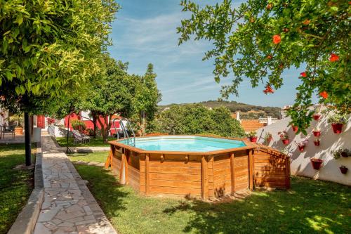 a swimming pool in a yard with trees at Algés Village Casa 4 by Lisbon-Coast vacation in Algés