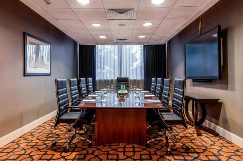 a conference room with a long table and chairs at Auburn Marriott Opelika Resort & Spa at Grand National in Opelika