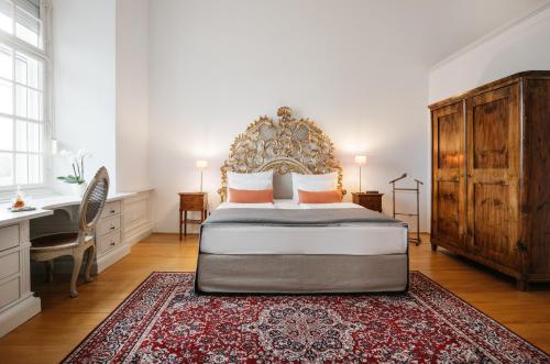 Ένα ή περισσότερα κρεβάτια σε δωμάτιο στο Hotel Schloss Leopoldskron