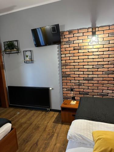 TV a/nebo společenská místnost v ubytování Hotel Nenufar Premium