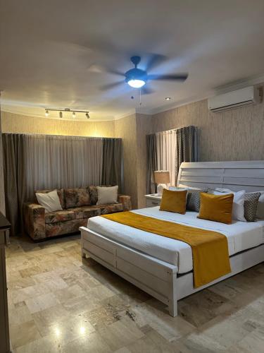Ένα ή περισσότερα κρεβάτια σε δωμάτιο στο Villa Esmeralda Residencial Cocotal Bavaro