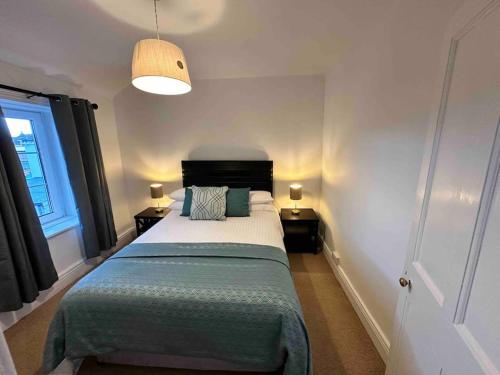 En eller flere senge i et værelse på Wonderful Town House