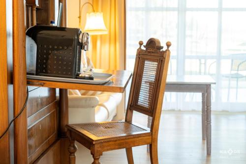 Posezení v ubytování Landhotel Rosenhof am Plauer See garni mit E-Lade Säule