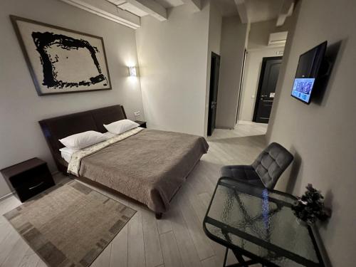 Телевизор и/или развлекательный центр в Hotel Nika 2