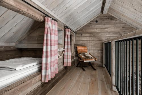 Postel nebo postele na pokoji v ubytování Luxurious cottage with sauna overlooking mountains