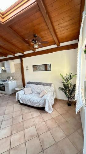 Ένα ή περισσότερα κρεβάτια σε δωμάτιο στο Casa vacanze profumo di mare