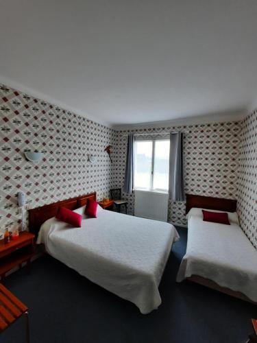 Postel nebo postele na pokoji v ubytování Auberge Béarn Bigorre