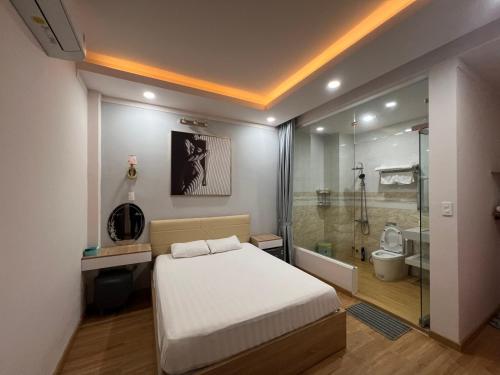 Postel nebo postele na pokoji v ubytování Cát Tiên Motel