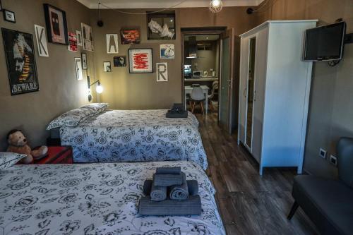 Habitación con 2 camas y una cámara. en Casa Via Po, en Turín