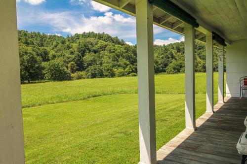 a porch of a house with a view of a field at Country Classic in Crumpler