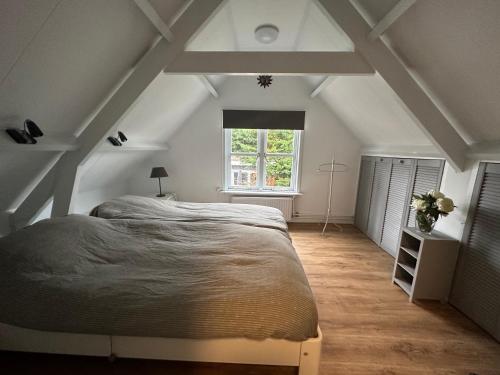 Postel nebo postele na pokoji v ubytování De Lijster