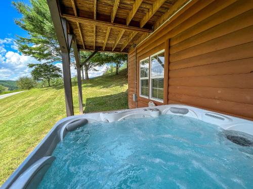 Φωτογραφία από το άλμπουμ του Breezy River Mountain Cabin σε Piney Creek