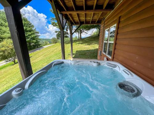 Φωτογραφία από το άλμπουμ του Breezy River Mountain Cabin σε Piney Creek