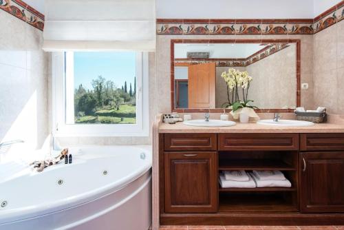 A bathroom at Magnificent Perama Villa - 4 Bedrooms - Villa Noulia - Gym - Great Pool Area - Corfu