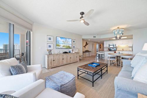 a living room with a couch and a table at Phoenix X 1203 in Perdido Key