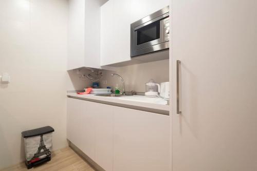 Кухня или мини-кухня в Hogar del Lirio
