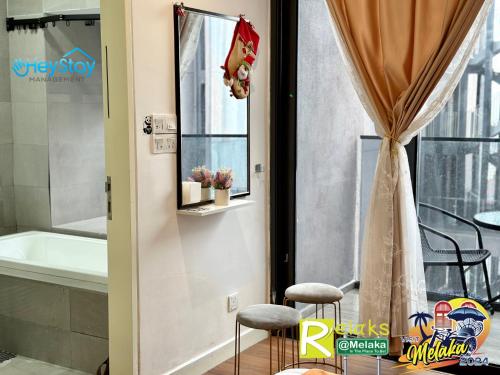Ένα μπάνιο στο Imperio Residence By Heystay Management