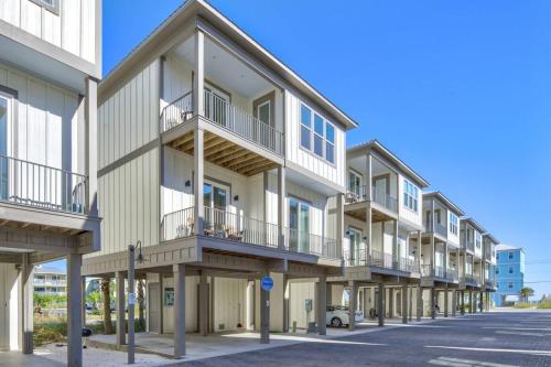 a row of apartment buildings with balconies at The Nautilus in Gulf Shores