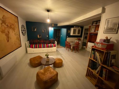 Posteľ alebo postele v izbe v ubytovaní Charmant appartement au cœur des volcans d Auvergne