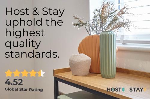 a sign that says host and stay uphold the highest quality standards at Host & Stay - Lop Hall in Danby