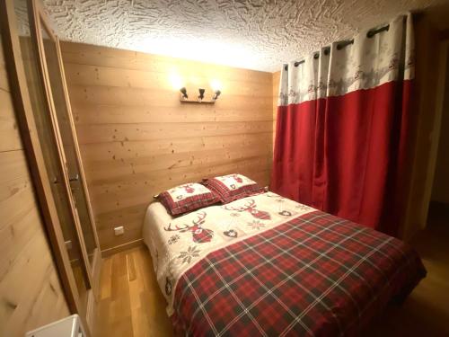 Katil atau katil-katil dalam bilik di Agréable duplex 60 m2 3 pièces a Auron