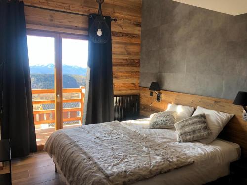Säng eller sängar i ett rum på Chalet Montana