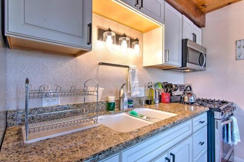 a kitchen with a sink and a counter top at Blissfully Wild -with Hot Tub and pets are welcome in Idyllwild
