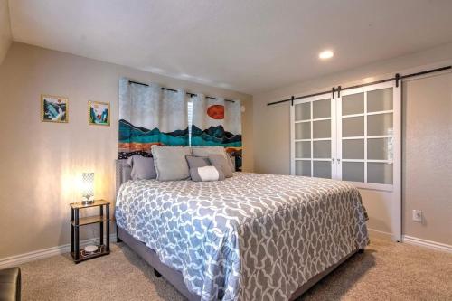 a bedroom with a large bed and a window at Blissfully Wild -with Hot Tub and pets are welcome in Idyllwild