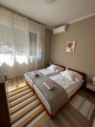 Kisvirág Apartmanにあるベッド