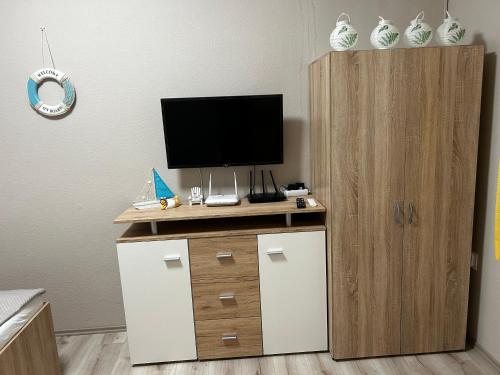 Kisvirág Apartmanにあるテレビまたはエンターテインメントセンター