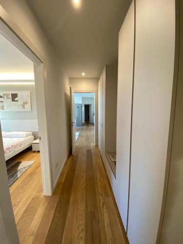 a hallway leading to a bedroom in a house at HZ+ Costantini in Pordenone