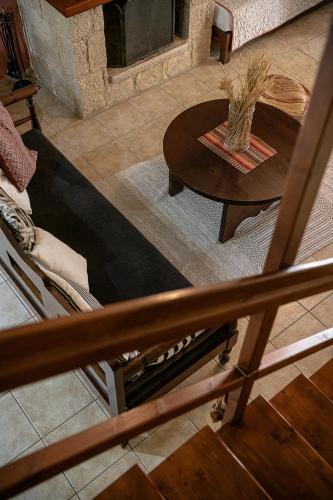 an overhead view of a living room with a table at Earino in Kato Asites