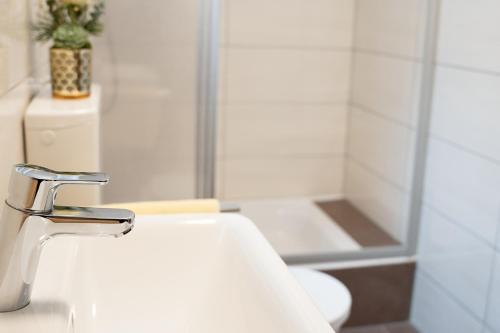 Ein Badezimmer in der Unterkunft Pension Fischinger