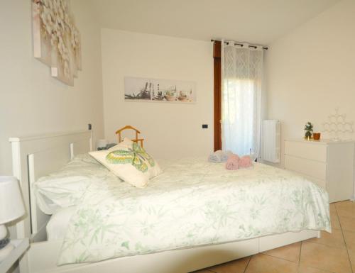 Кровать или кровати в номере Domus Padova San Marco