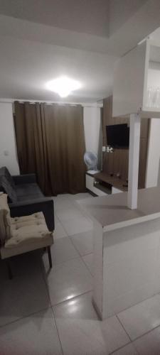 TV a/nebo společenská místnost v ubytování Apto familiar c/ piscina, próx as praias reg Sul