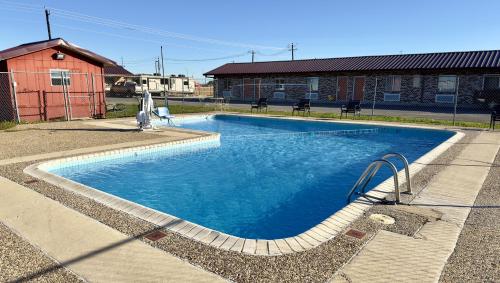 Bazén v ubytování Regency Inn Hondo nebo v jeho okolí