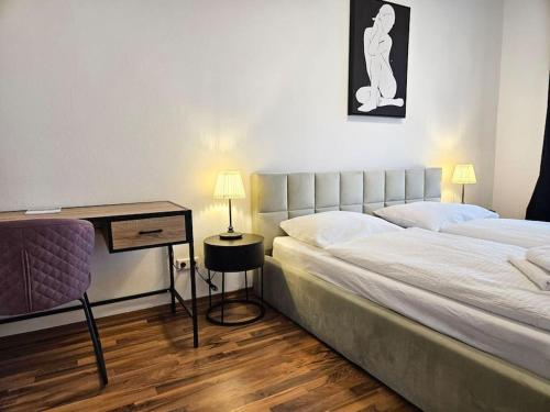 Giường trong phòng chung tại Zentrales 2 Raum Apartment