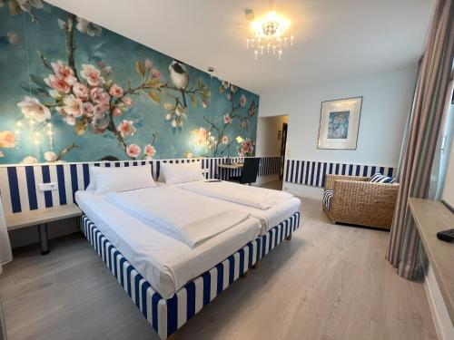 Katil atau katil-katil dalam bilik di Aparthotel Deutschmeister