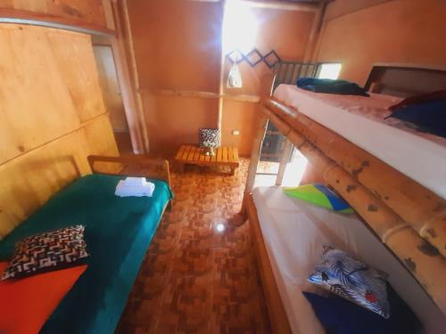 Cama o camas de una habitación en El Eden Minca