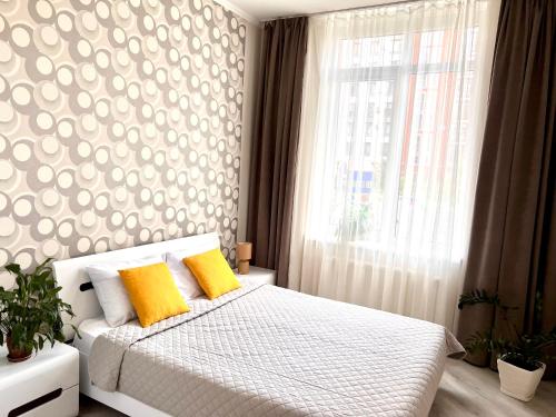 Posteľ alebo postele v izbe v ubytovaní OSapart Beautiful apartment in a complex Semycvit