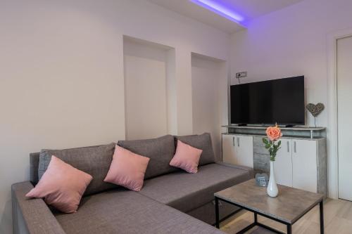 TV a/nebo společenská místnost v ubytování Apartment Monika